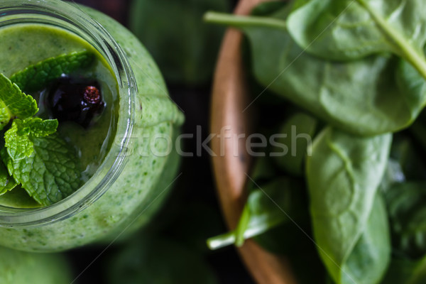 Smoothie verde jarra banana espinafre fresco ervas Foto stock © kkolosov