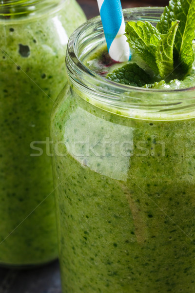 Smoothie verde jarra tiro banana espinafre Foto stock © kkolosov