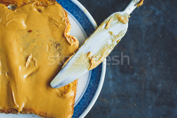 Beurre d'arachide sandwiches lumière bois pain déjeuner [[stock_photo]] © kkolosov