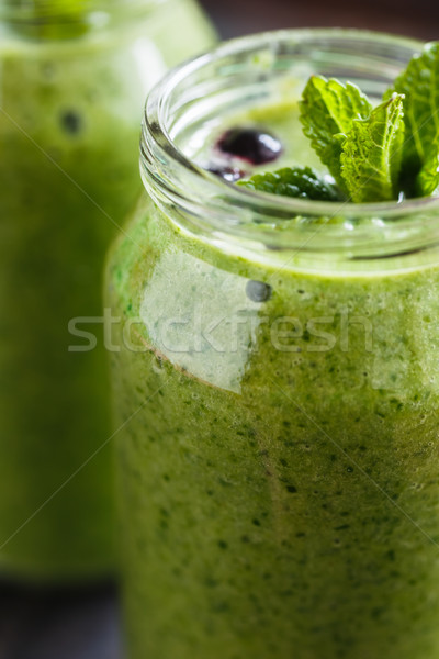Smoothie verde jarra tiro banana espinafre Foto stock © kkolosov