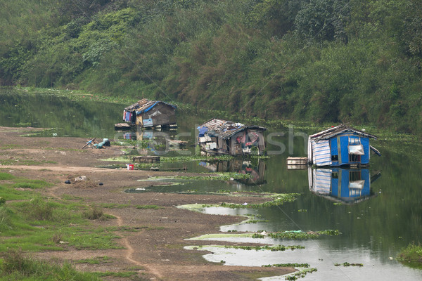 living in slum boats on the Red River. Stock photo © Klodien