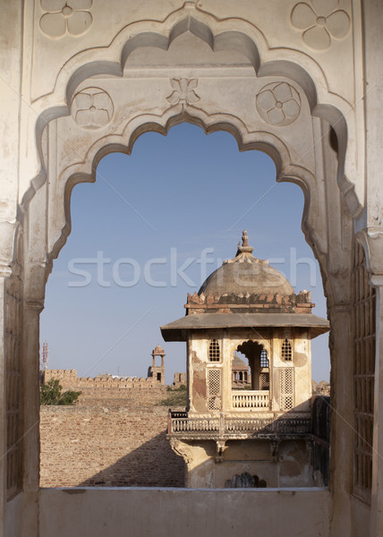 Looking on the roof structures through a double peacock arch at Nagaur's palace in Rajasthan. Stock photo © Klodien
