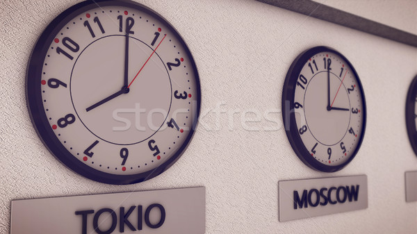 Clocks on wall, symbol for Greenwich Mean Time Stock photo © klss