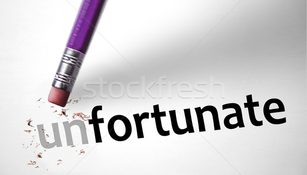 Eraser changing the word Unfortunate for Fortunate  Stock photo © klublu