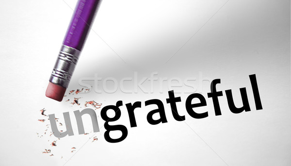Eraser changing the word Ungrateful for grateful  Stock photo © klublu