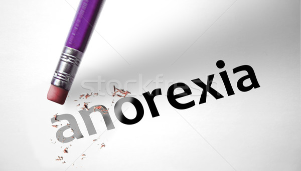 Stock photo: Eraser deleting the word Anorexia 