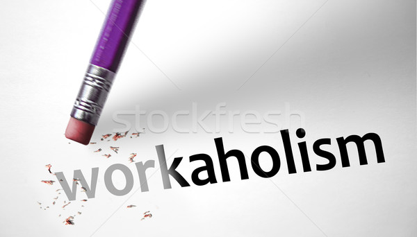 Eraser deleting the word Workaholism  Stock photo © klublu