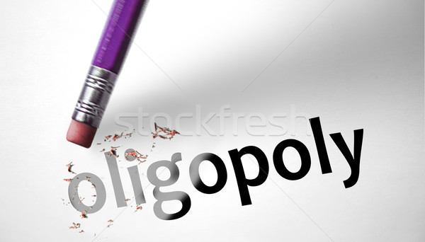 Eraser deleting the word Oligopoly  Stock photo © klublu