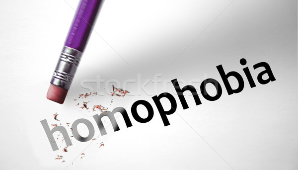 Eraser deleting the word Homophobia  Stock photo © klublu
