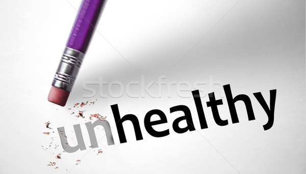 Eraser changing the word Unhealthy for Healthy  Stock photo © klublu