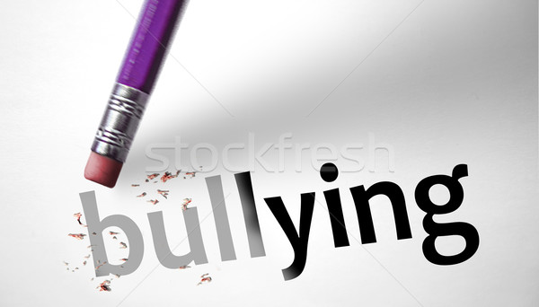 Eraser deleting the word Bullying  Stock photo © klublu