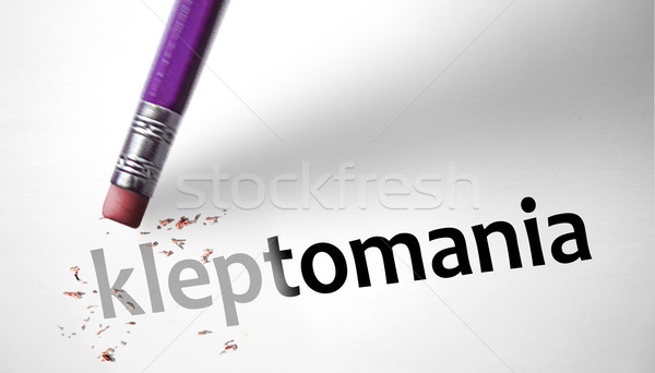 Eraser deleting the word Kleptomania  Stock photo © klublu