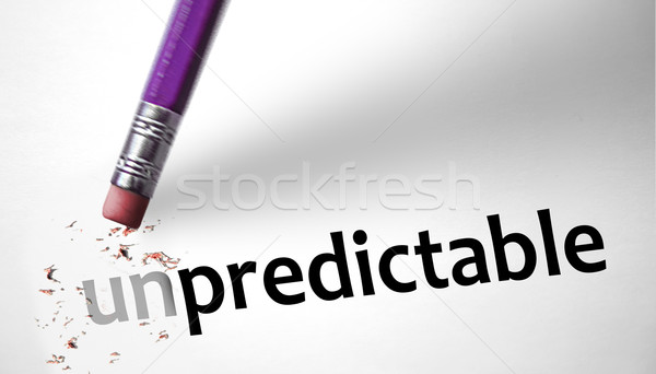 Eraser changing the word Unpredictable for Predictable  Stock photo © klublu