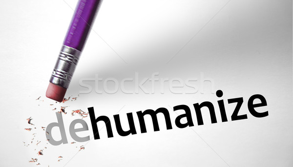 Eraser changing the word Dehumanize for Humanize  Stock photo © klublu