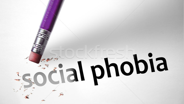 Eraser deleting the concept Social Phobia  Stock photo © klublu