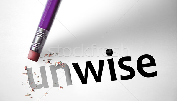 Eraser changing the word Unwise for Wise  Stock photo © klublu