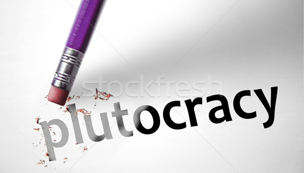 Stock photo: Eraser deleting the word Plutocracy 