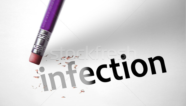 Eraser deleting the word Infection  Stock photo © klublu