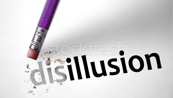 Eraser changing the word disillusion for illusion  Stock photo © klublu