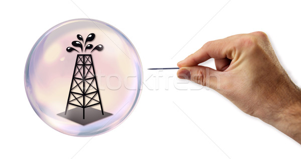 Oil value Bubble about to explode by a needle  Stock photo © klublu