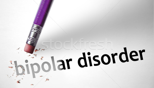 Stock photo: Eraser deleting the concept Bipolar Disorder 