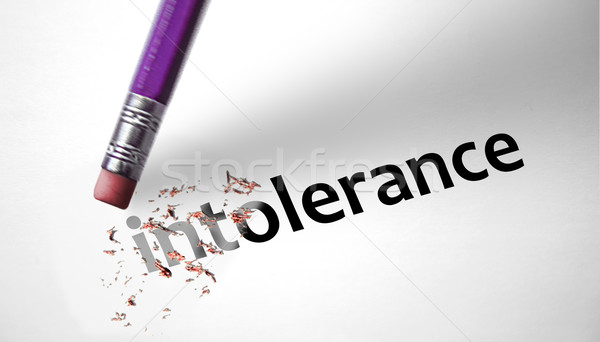 Eraser deleting the word Intolerance  Stock photo © klublu