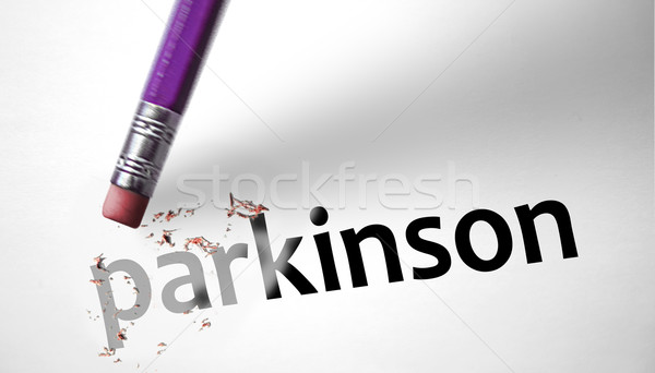 Eraser deleting the word Parkinson  Stock photo © klublu