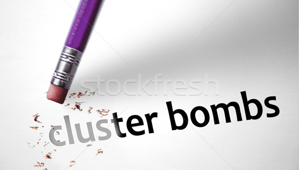 Eraser deleting the concept Cluster Bombs  Stock photo © klublu