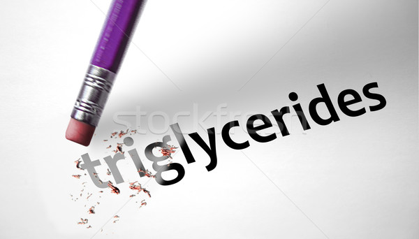 Eraser deleting the word Triglycerides  Stock photo © klublu