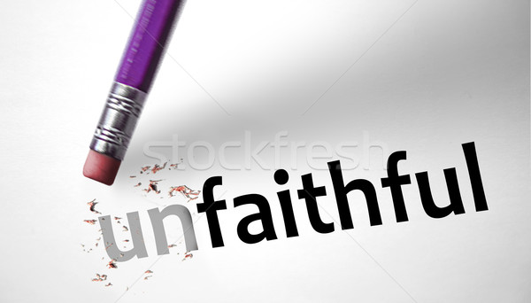 Stock photo: Eraser changing the word Unfaithful for Faithful 