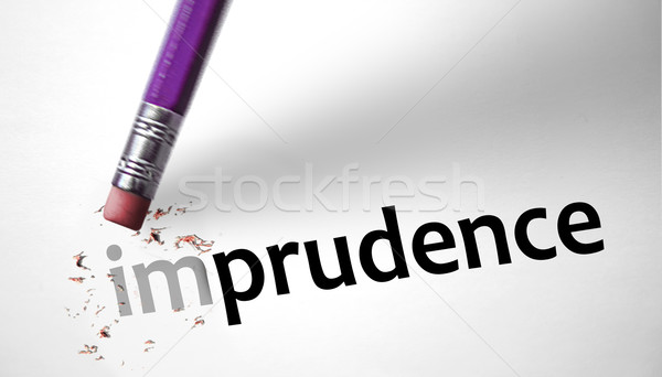 Eraser changing the word Imprudence for Prudence  Stock photo © klublu