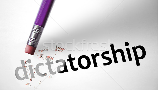 Eraser deleting the word Dictatorship  Stock photo © klublu