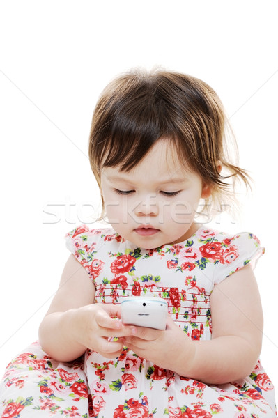 Infant girl with phone Stock photo © KMWPhotography