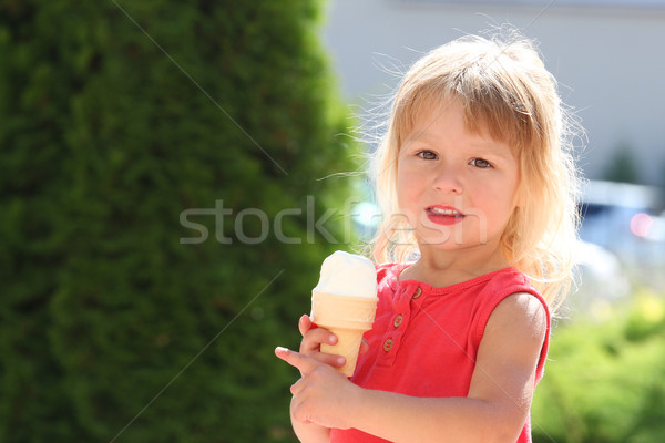 little girl eating ice cream outdoors Stock photo © koca777