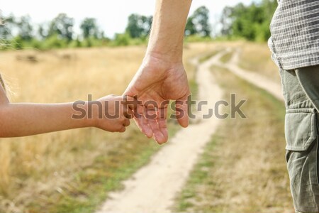 Padres mano pequeño nino familia seguridad Foto stock © koca777