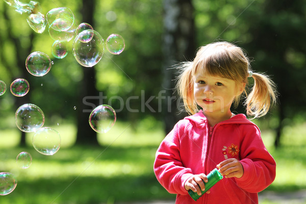  girl with soap bubbles Stock photo © koca777