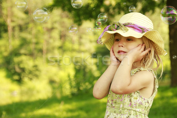 little girl with soap bubbles  Stock photo © koca777