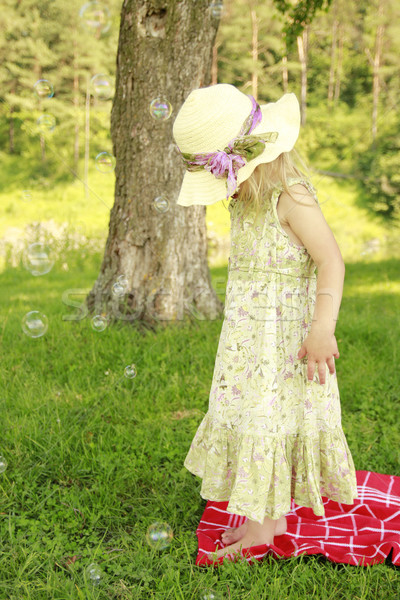 Petite fille bulles de savon femme fille main bébé [[stock_photo]] © koca777