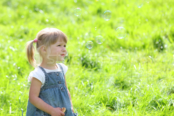 little girl with soap bubbles Stock photo © koca777