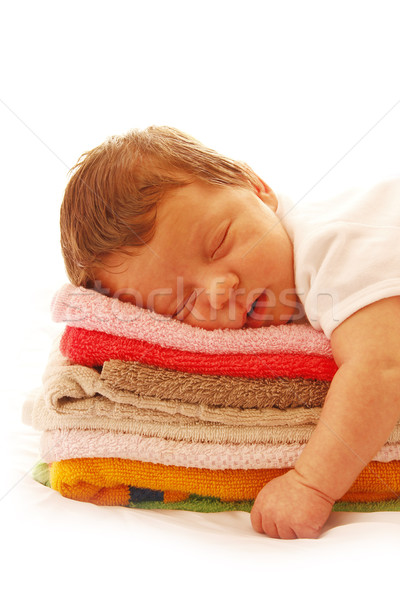 one cute little newborn baby lying on towels  Stock photo © koca777