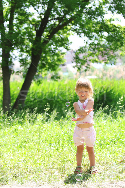 little girl with soap bubbles Stock photo © koca777