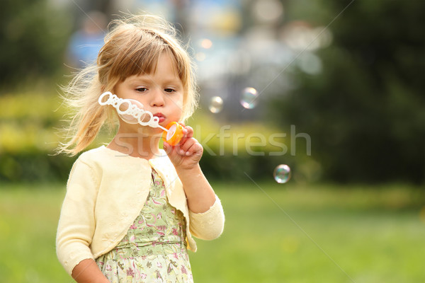 little girl with soap bubbles  Stock photo © koca777