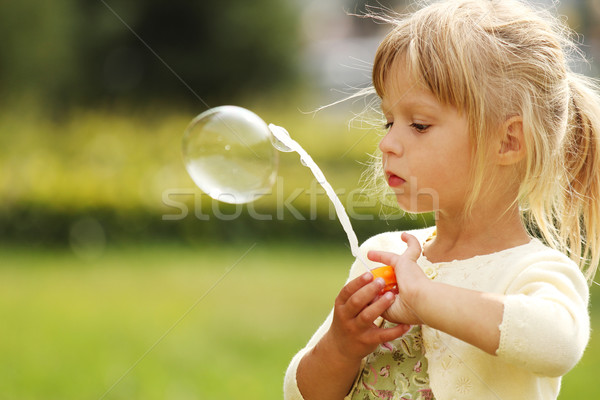 little girl with soap bubbles  Stock photo © koca777