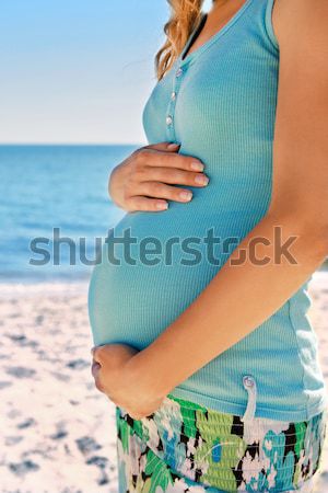 Femme enceinte plage femme eau mains amour [[stock_photo]] © koca777