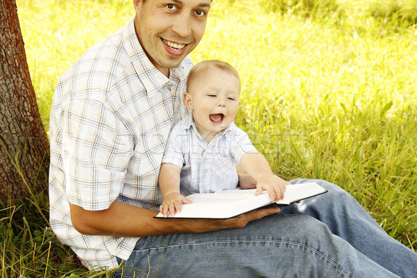 young father with a young son reads the Bible Stock photo © koca777