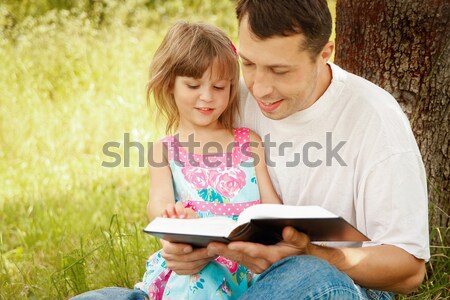 young father with his little daughter reads the Bible  Stock photo © koca777