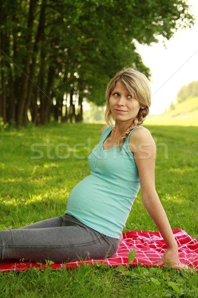 beautiful young pregnant girl on nature Stock photo © koca777