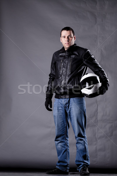 motorist with a helmet, leather jacket and jeans Stock photo © kokimk