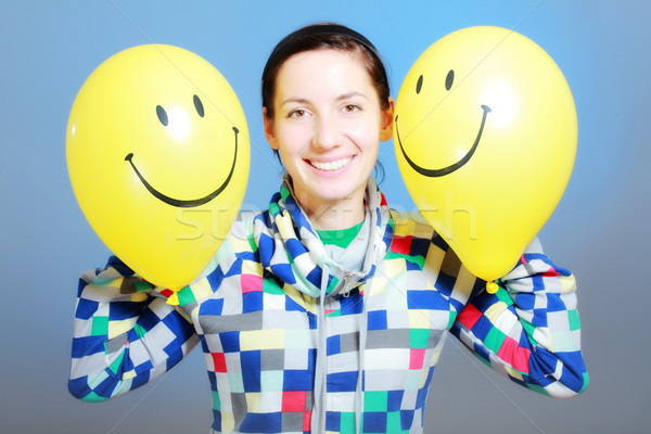 Kız iki balonlar sarı mavi Stok fotoğraf © kokimk
