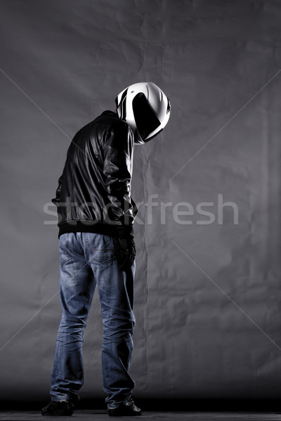 motorist with a helmet, leather jacket and jeans Stock photo © kokimk